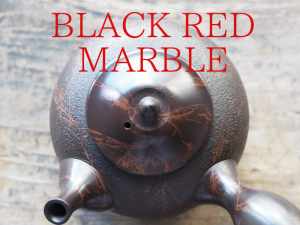 black red marble teapot