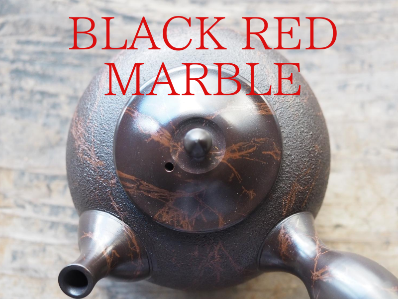 black red marble teapot